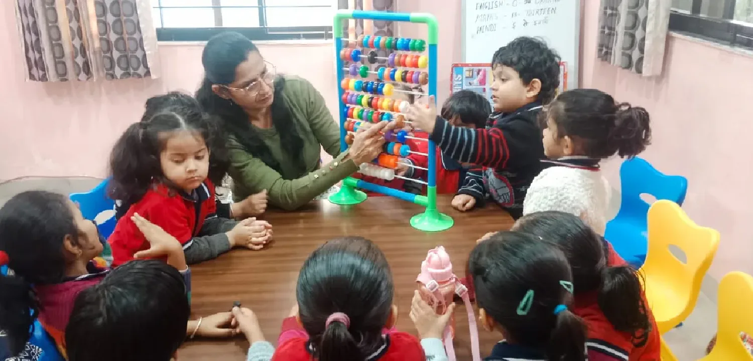 Teacher with children in classroom